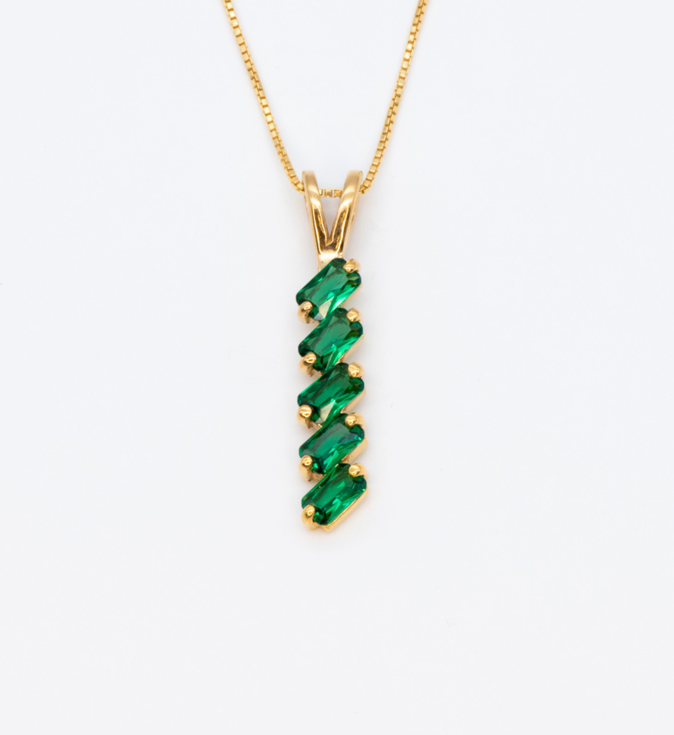 Baguette Emerald May birthstone Pendant crafted in 18k Yellow Gold Vermeil over solid 925 sterling silver, in a prong setting, and stunning green color. Vertical necklace perfect for date night or special occasions, and ideal gift for her. Green gemstone pendant encourages growth, harmony, and deep emotional healing.