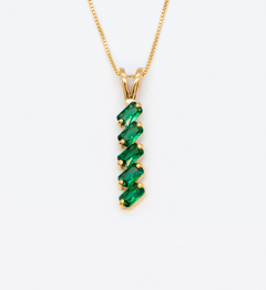 Baguette Emerald May birthstone Pendant crafted in 18k Yellow Gold Vermeil over solid 925 sterling silver, in a prong setting, and stunning green color. Vertical necklace perfect for date night or special occasions, and ideal gift for her. Green gemstone pendant encourages growth, harmony, and deep emotional healing.