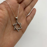 Sterling silver star necklace perfect for style simplicity or layered looks.