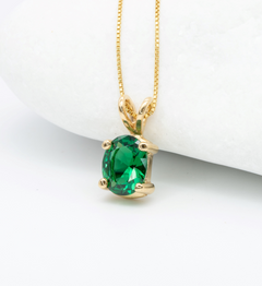 Solitaire Emerald May birthstone Necklace crafted in 18k yellow gold over solid 925 sterling silver. Oval emerald gemstone encourages growth, harmony, and deep emotional healing. Perfect anniversary present, ideal for casual and formal wear.