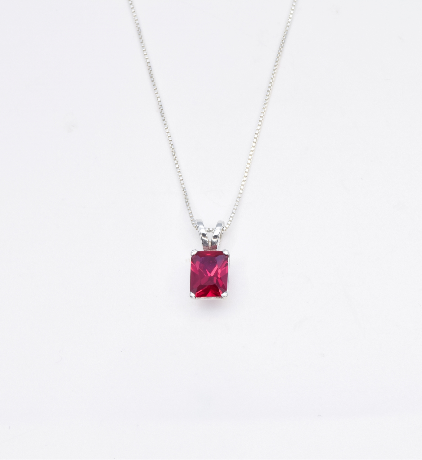 July birthstone Ruby necklace set in solid 925 sterling silver, in a baguette cut, and prong setting. This Solitaire ruby pendant is perfect for special occasions, for layering necklaces or wearing solo. Square ruby necklace boosts confidence, enhances courage, and inspires love and success. For passion, protection, vitality