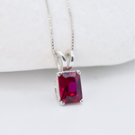 Solitaire Ruby necklace set in solid 925 sterling silver, in a baguette cut, and prong setting. This Square ruby pendant is perfect for special occasions, for layering necklaces or wearing solo. July birthstone necklace boosts confidence, enhances courage, and inspires love and success. 