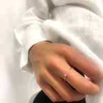 Aura & Faith dainty ruby two-stone gold ring, lifestyle view
