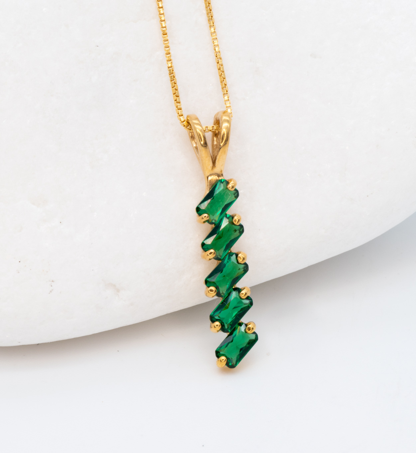 Emerald May birthstone Necklace crafted in 18k Yellow Gold Vermeil over solid 925 sterling silver, in baguette cuts, prong setting, and stunning green color. Vertical necklace perfect for date night or special occasions, and ideal gift for her. Green gemstone pendant encourages growth, harmony, and deep emotional healing.