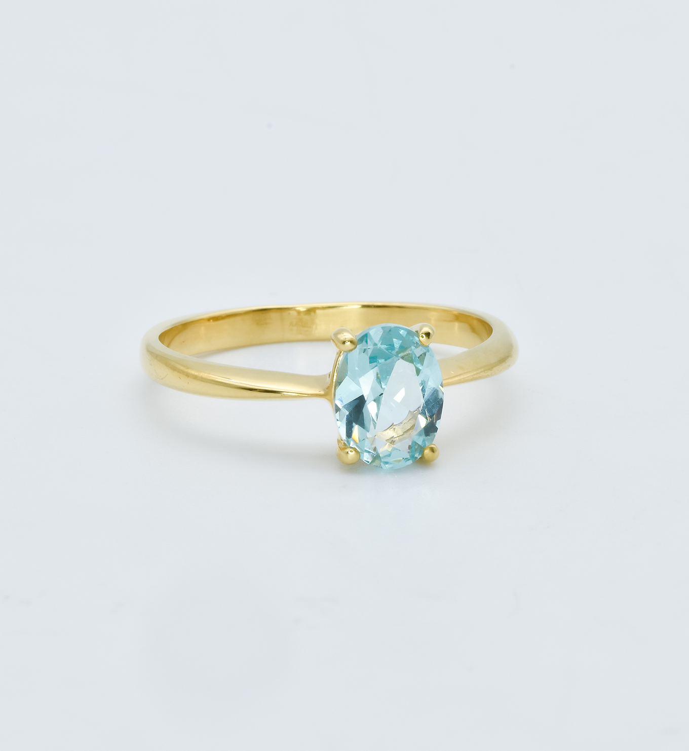 Gold Aquamarine Ring in side setting