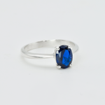 Oval Sapphire Ring in side setting