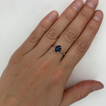 Oval Sapphire Ring worn on middle finger