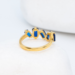Created Sapphire Ring in Baguette Cut, set in 18k Gold Plating over Solid Sterling Silver
