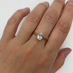 Closer shot of Solitaire Diamond Ring, Diamond Engagement Ring, Gold Diamond Ring worn on middle finger