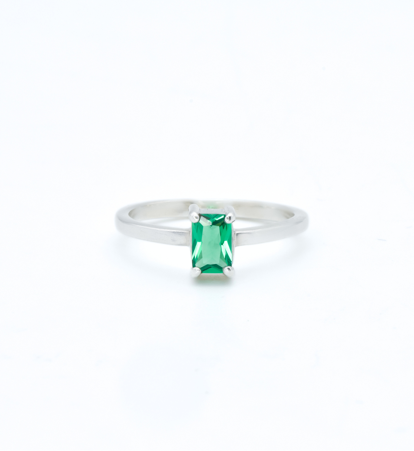 925 Sterling Silver ring with emerald may birthstone in baguette cut and prong setting. Green solitaire ring ideal for special occasions, and everyday ring. Encourages growth, harmony, and deep emotional healing. For love, renewal, wisdom 