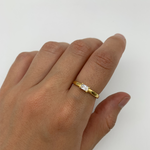 Gold Diamond Ring worn on index finger