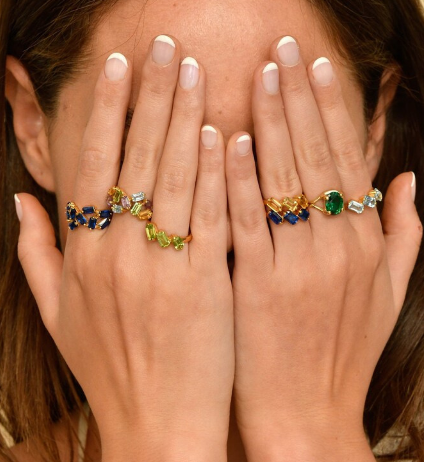 Woman wearing stackable rings, ideal ring stacking style, ring stacking ideas. 925 Sterling Silver ring with real peridot august birthstone in baguette cut and prong setting. Three stone ring ideal for birthday gift and special events. Promotes emotional balance, joy, and clears negative energy. For abundance, healing, protection. How to wear stackable rings