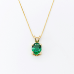 Green Emerald May birthstone Necklace crafted in 18k yellow gold over solid 925 sterling silver. Oval emerald gemstone encourages growth, harmony, and deep emotional healing. Solitaire pendant perfect anniversary present, ideal for casual and formal wear.