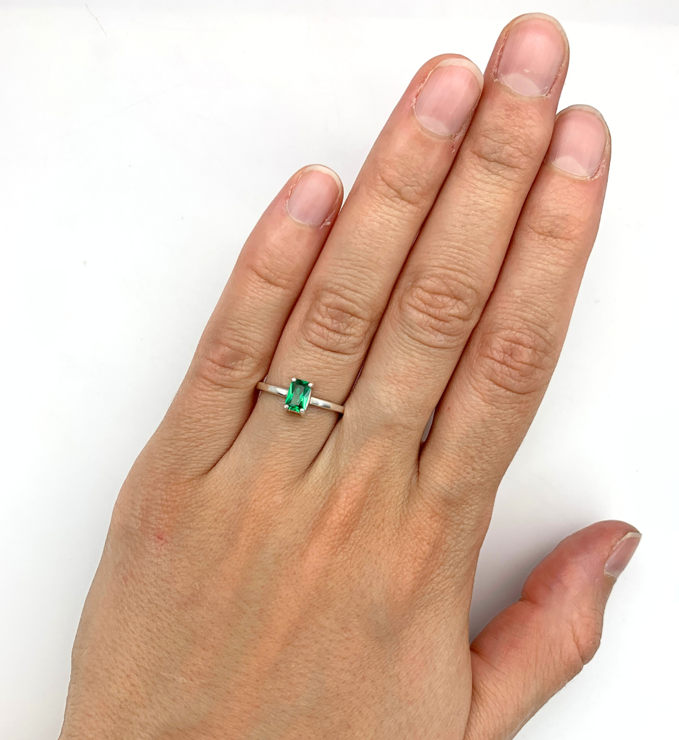 925 Sterling Silver ring with emerald may birthstone in baguette cut and prong setting. Handcrafted solitaire ring ideal for special occasions and stacking rings. Encourages growth, harmony, and deep emotional healing.
For love, renewal, wisdom 
