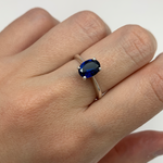 Closer shot of Oval Sapphire Ring worn on middle finger