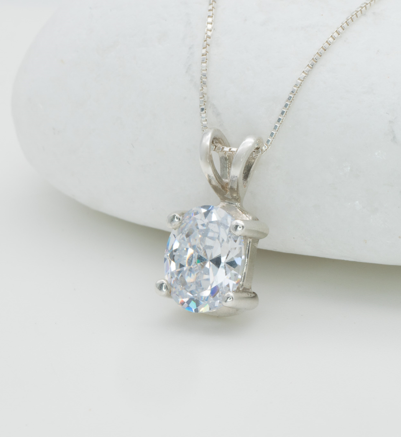 Oval Diamond Necklace set in solid 925 sterling silver, April birthstone in prong setting and stunning color. Diamond pendant ideal for casual and formal occasions. CZ Diamond symbolizes eternal love, purity, and inner strength. For strength, clarity, abundance