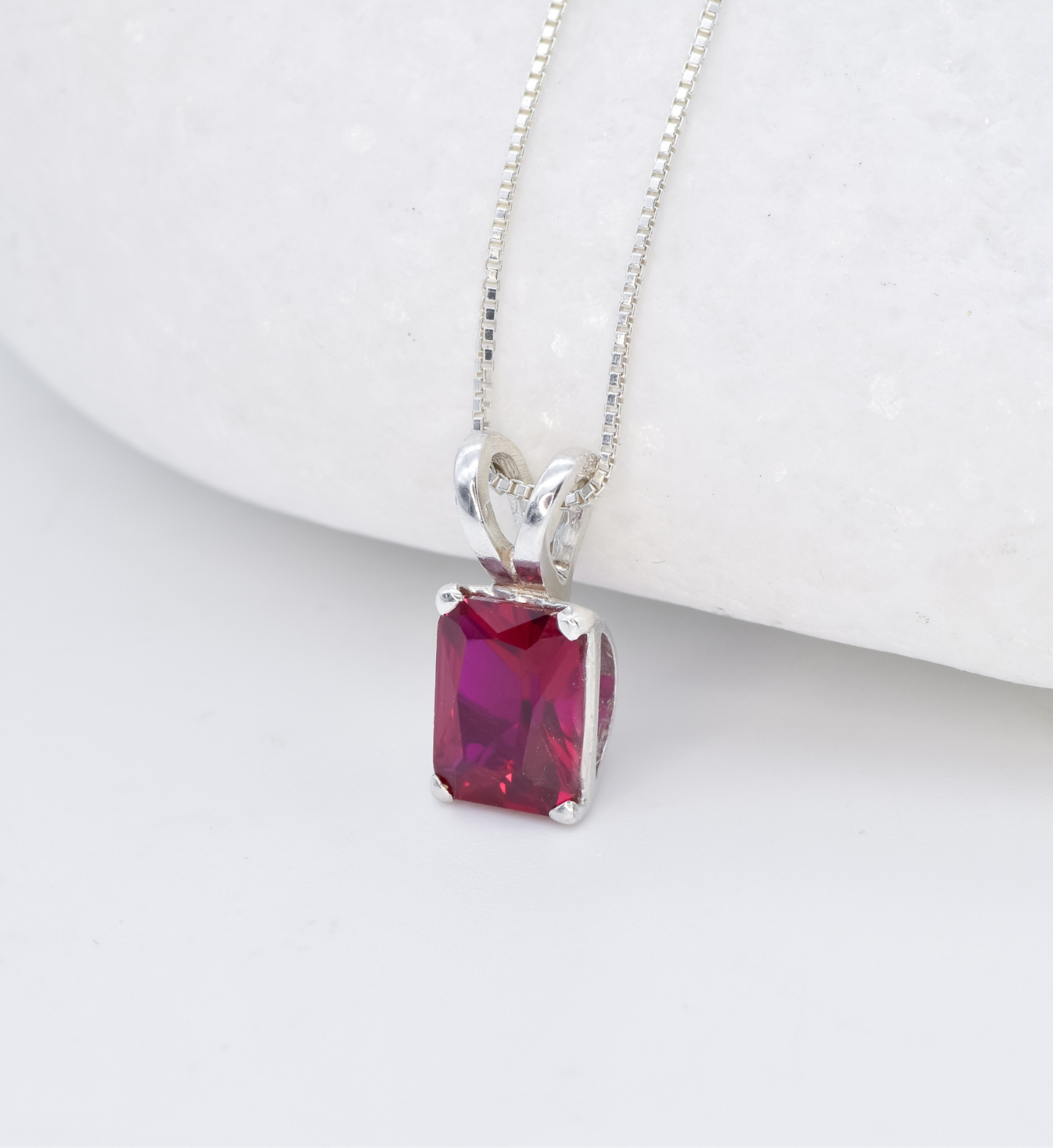 Red Ruby necklace set in solid 925 sterling silver, in a baguette cut, and prong setting. This Solitaire ruby pendant is perfect for special occasions, for layering necklaces or wearing solo. Square ruby necklace boosts confidence, enhances courage, and inspires love and success. For passion, protection, vitality