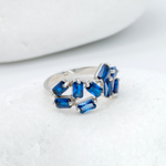 925 Sterling Silver ring with Sapphire September birthstone in emerald cut and prong setting. Handcrafted silver sapphire ring ideal for special occasions and as personalized gift. Sapphire encourages truth, mental clarity, and spiritual insight. For wisdom, loyalty, focus