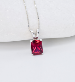 Red Ruby July birthstone necklace set in solid 925 sterling silver, in a baguette cut, and prong setting. This Solitaire ruby pendant is perfect for special occasions, for layering necklaces or wearing solo. Square ruby necklace boosts confidence, enhances courage, and inspires love and success. For passion, protection, vitality