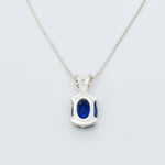 925 Sterling Silver necklace with Sapphire September birthstone in oval cut and prong setting. Solitaire pendant ideal gift for her, and for everyday wear. Blue sapphire pendant encourages truth, mental clarity, and spiritual insight. For wisdom, loyalty, focus